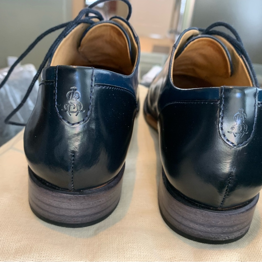 Office of Angela Scott Mr. Evans
Black and Ocean shoes 7.5